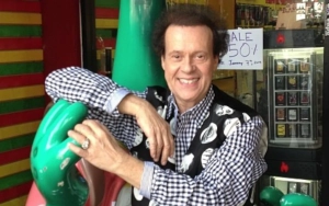 Richard Simmons Buried in Fitness Gear for Heavenly Workout