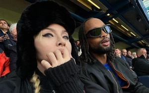 Madonna Nearly Unrecognizable in Headscarf and Long Dress During Stroll With BF Akeem Morris