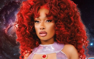  Megan Thee Stallion Stuns as Starfire for Halloween