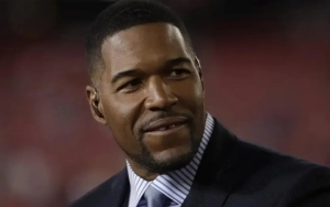 Michael Strahan Tosses Journalist's Phone Into Bush When Being Asked About National Anthem Controversy