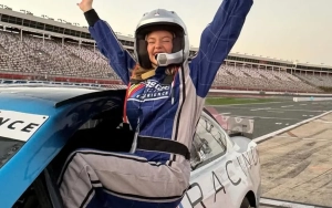 Sydney Sweeney Beams With Happiness as She Drives Race Car