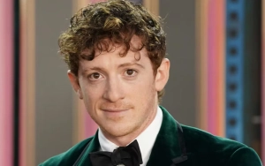 Ethan Slater Takes a Tumble on Wet Floor on Rainy Day at 'Wicked' Premiere