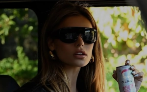 Brooks Nader Pumping Gas in Skin-Tight Red Outfit During Solo Day Out