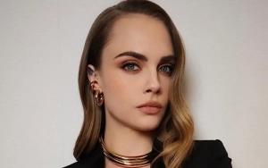 Cara Delevingne Sparks Frenzy with Baby Bump Photo to Mark New Year