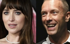 Dakota Johnson and Chris Martin Hold Hands in India, Quashing Breakup Rumors