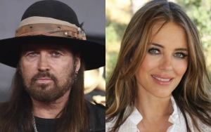 Billy Ray Cyrus and Elizabeth Hurley Debut Romance With Easter Kiss
