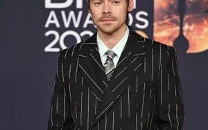 Harry Styles Stuns in Chanel Pinstripes and Ballet Flats at 2026 Brits