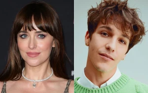 Dakota Johnson and Role Model Spotted at Paul McCartney Concert