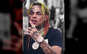 Tekashi 6ix9ine Released From Jail Wearing Messy Wig and Holding Signed Toy