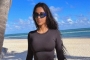 Kim Kardashian Takes Down Bikini Photo After Photoshop Fail