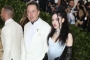 Grimes Reveals She and Elon Musk Secretly Welcomed Baby Girl Amid 'Fluid' Relationship