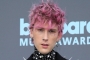Machine Gun Kelly Scolded for Trying to Pour His Own Drink at Bar