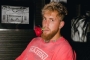 Jake Paul Bizarrely Spars With Huge Sex Toys on Christmas to Prove There's 'No Days Off'