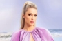 Paris Hilton Wishes She Could Have the Experience of 'Growing Baby' Inside Her Belly