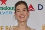 Rosamund Pike Ditches Headpiece at 2024 BAFTA Tea Party Despite 'Messed Up' Chin Injury