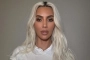 Kim Kardashian Flaunts Curves in White Dress While Leaving Calabasas Office