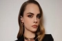 Cara Delevingne Sparks Frenzy with Baby Bump Photo to Mark New Year