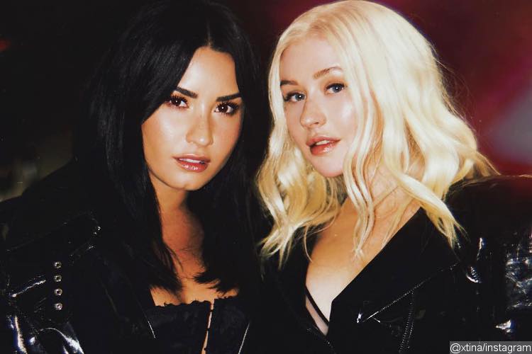 Christina Aguilera Collaborates With Demi Lovato on Feminist Anthem 'Fall in Line'