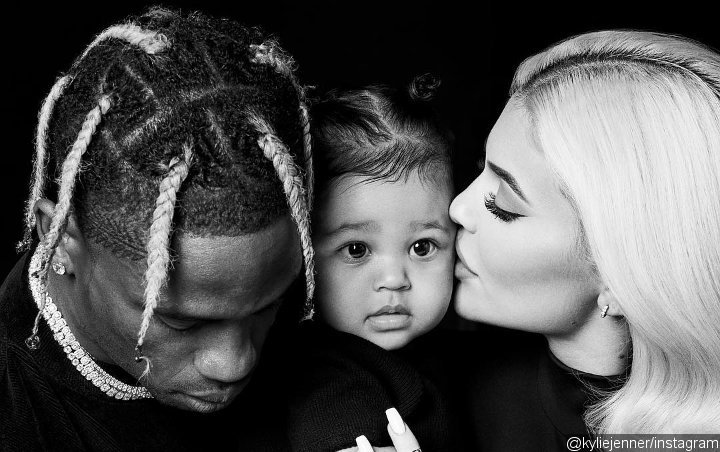 Kylie Jenner and Travis Scott Cuddle With Baby Stormi in Heartwarming Thanksgiving Pic