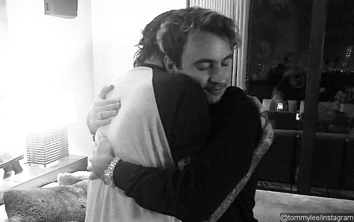 Tommy Lee Celebrates Son Reconciliation With Hugging Photo