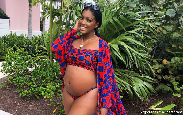 Porsha Williams Flaunts Her Bare Baby Bump in Colorful Bathing Suit During Babymoon