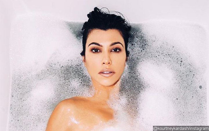 Kourtney Kardashian Is Trolled for Photoshop Fail After Fans Notice 'Missing Thigh' in Nude Photo