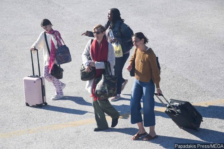 Katie Holmes and Suri Cruise Return After a Volunteer Work Trip in Greece