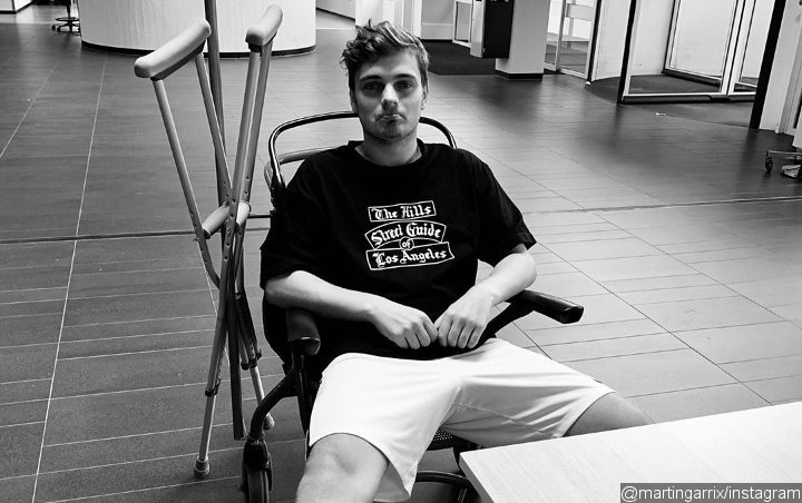 Martin Garrix Forced to Cancel Shows for Four Weeks Due to Injured Ankle
