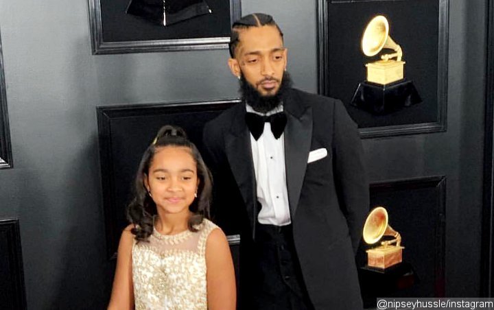 Nipsey Hussle's Daughter Emani Gives Sweet Shout-Out to Late Father at Her Graduation