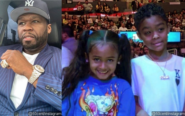 50 Cent Pokes Fun at Son for Looking 'Scared' When Posing With Chris Brown's Daughter 