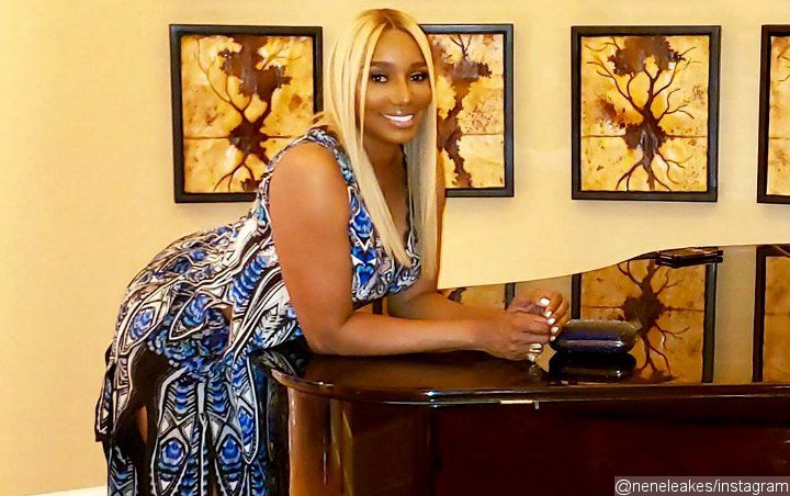 NeNe Leakes Seemingly Hits Back at 'RHOA' Co-Stars After Being Left Out From Group Photo