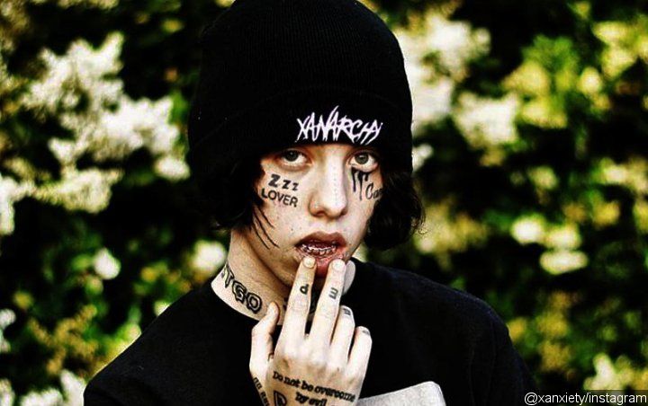 Lil Xan Curses at Concertgoer for Trying to Pull Him Offstage Forcefully