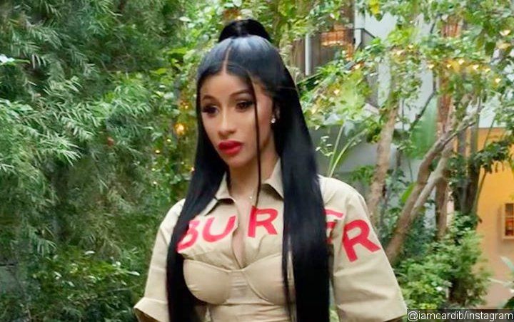 Cardi B Jokes About Her Breast Implants as She Proudly Displays Boobs