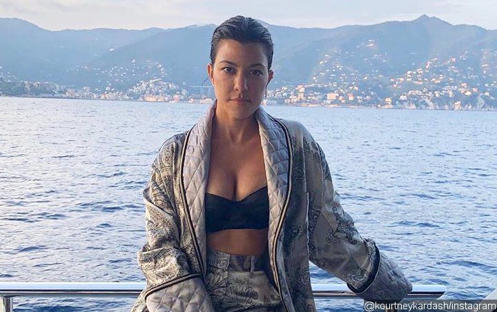 Kourtney Kardashian Hits Back at Troll Criticizing Her for Going on a Trip Instead of Working