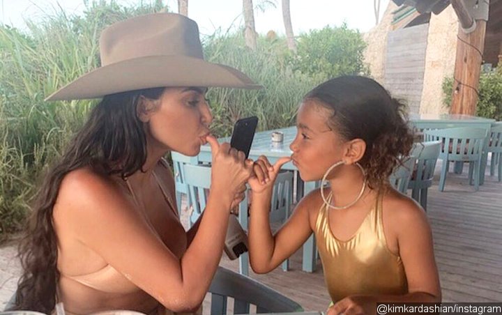 Kim Kardashian Slammed for Letting Daughter North West Wear Massive Hoop Earrings