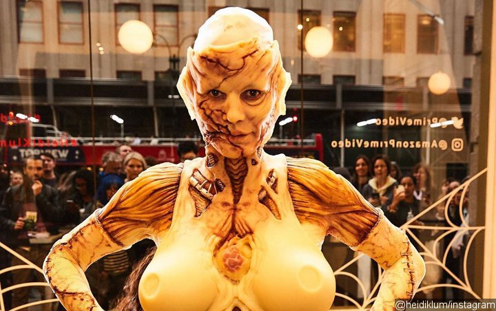Heidi Klum Debuts Creepy Sci-Fi-Themed Halloween Costume After 13-Hour Transformation