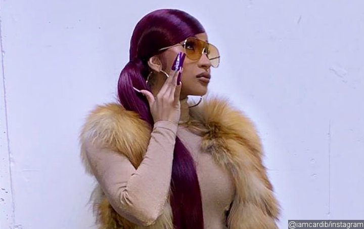 Cardi B Sparks Debate Over Her Giant Fur Coat at NBA All-Star Game