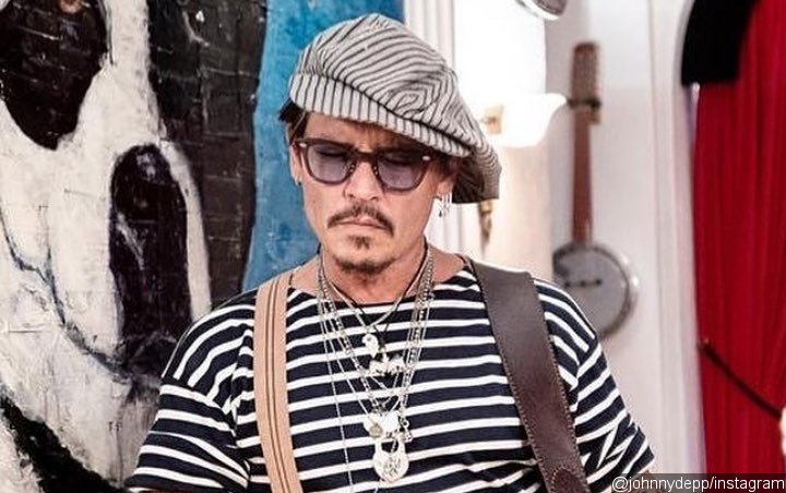 Johnny Depp Shows Off Wine Bottle Painting He Completed After 14 Years