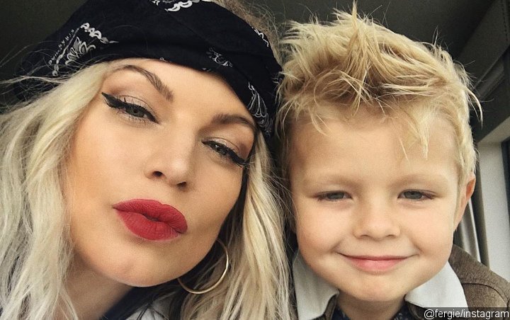 Fergie Gives Young Son Firsthand Experience of Black Lives Matter Protest