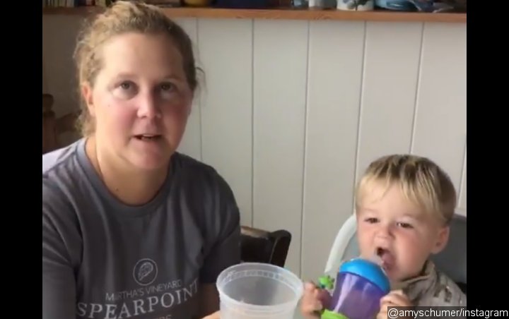 Video: Amy Schumer's Son Startled by Mom's Reaction to His First Time Saying 'Dad'