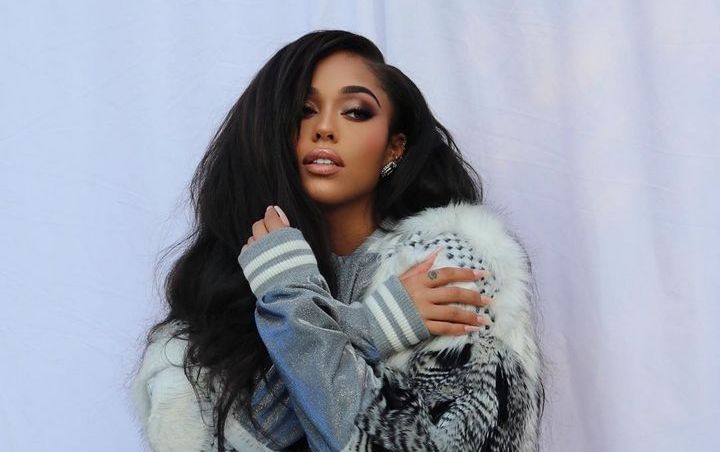 Jordyn Woods Credits Fitness for Helping Her Cope With Father's Death