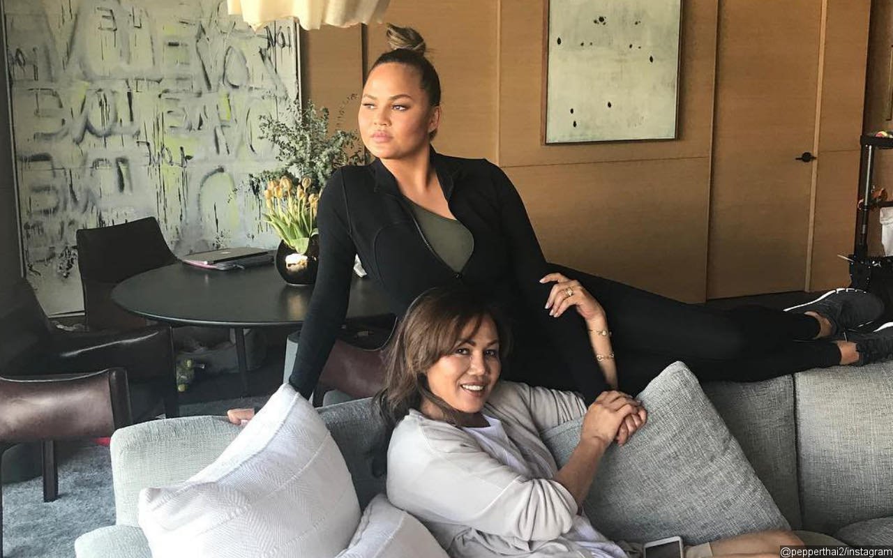 Chrissy Teigen Gets Through 'Hardest 4 Days' of Her Life by Cuddling Up to Mother