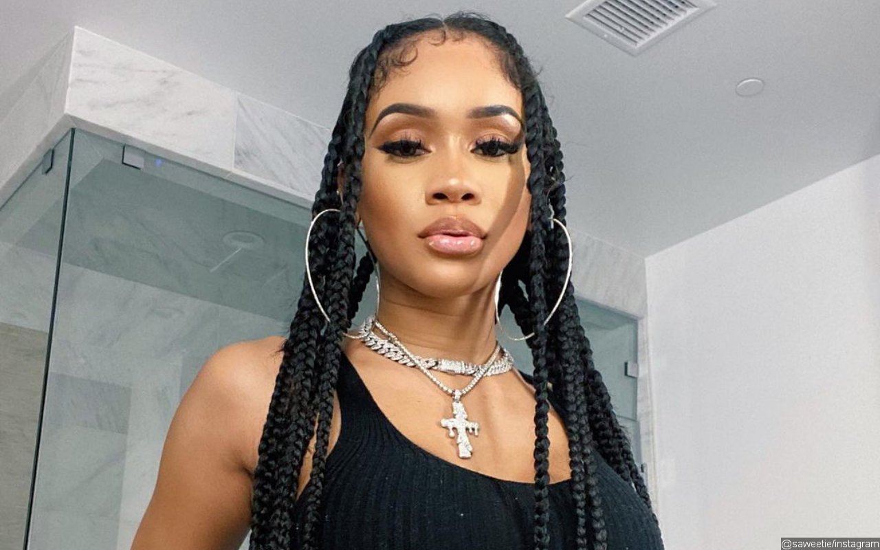 Saweetie Fires Back at Hater Calling Her 'Dumb': 'Don't Be Mad at Me'
