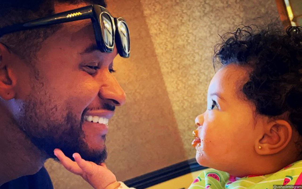 Usher All Smiles in Rare Pic With His Third Child 