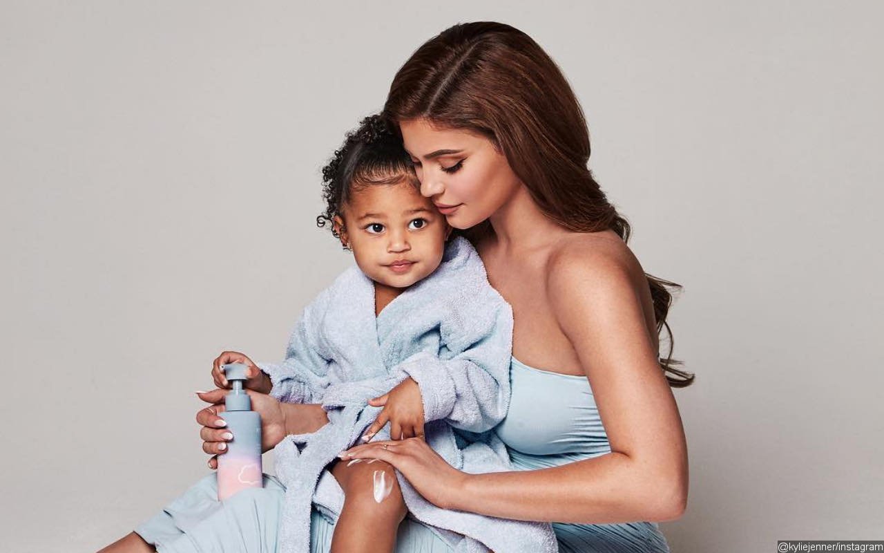 Kylie Jenner Treats Fans to Unseen Picture of Stormi Kissing Her Baby Bump