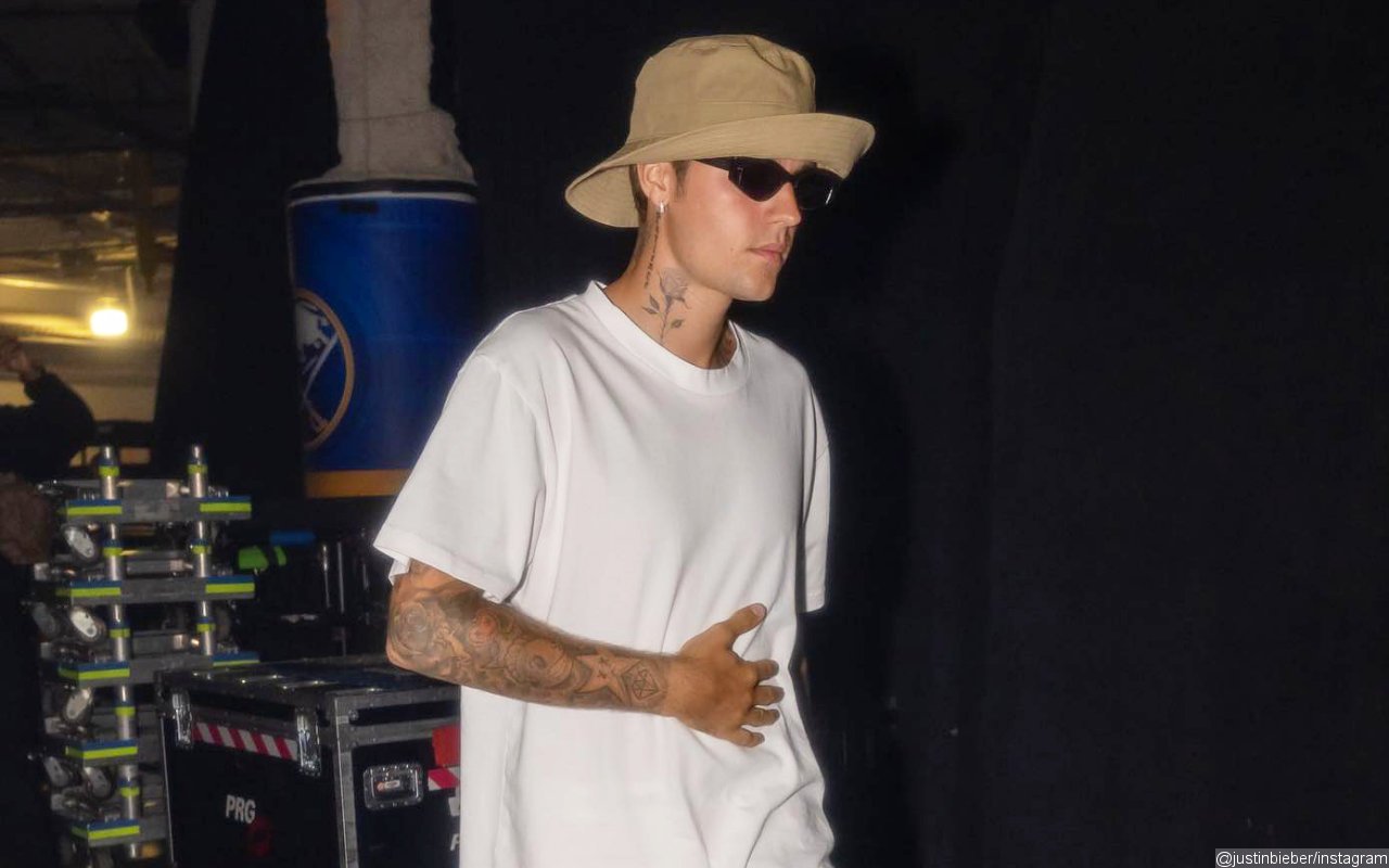 Justin Bieber Spotted With Pants Around Knees Behind Tree at Golf Club