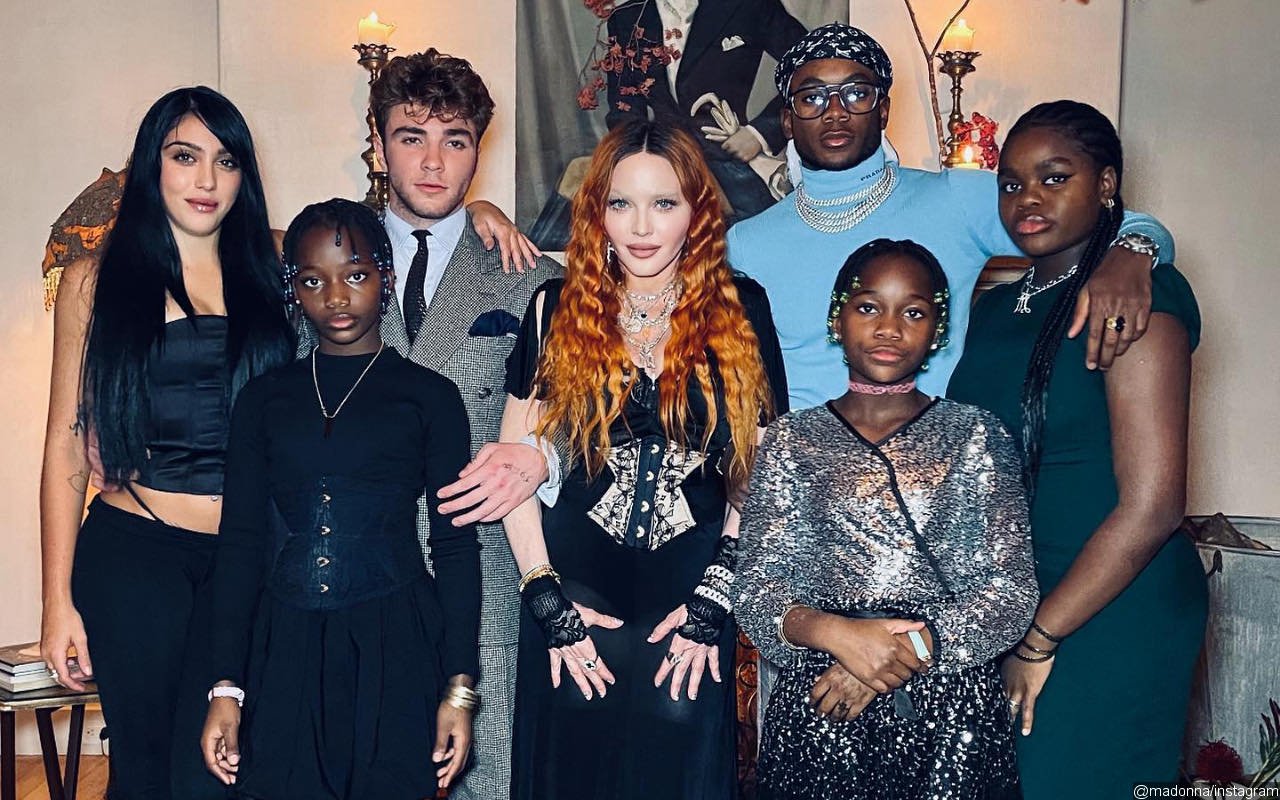 Madonna Rocks Sexy Low-Cut Dress as She Celebrates Thanksgiving With Six Children