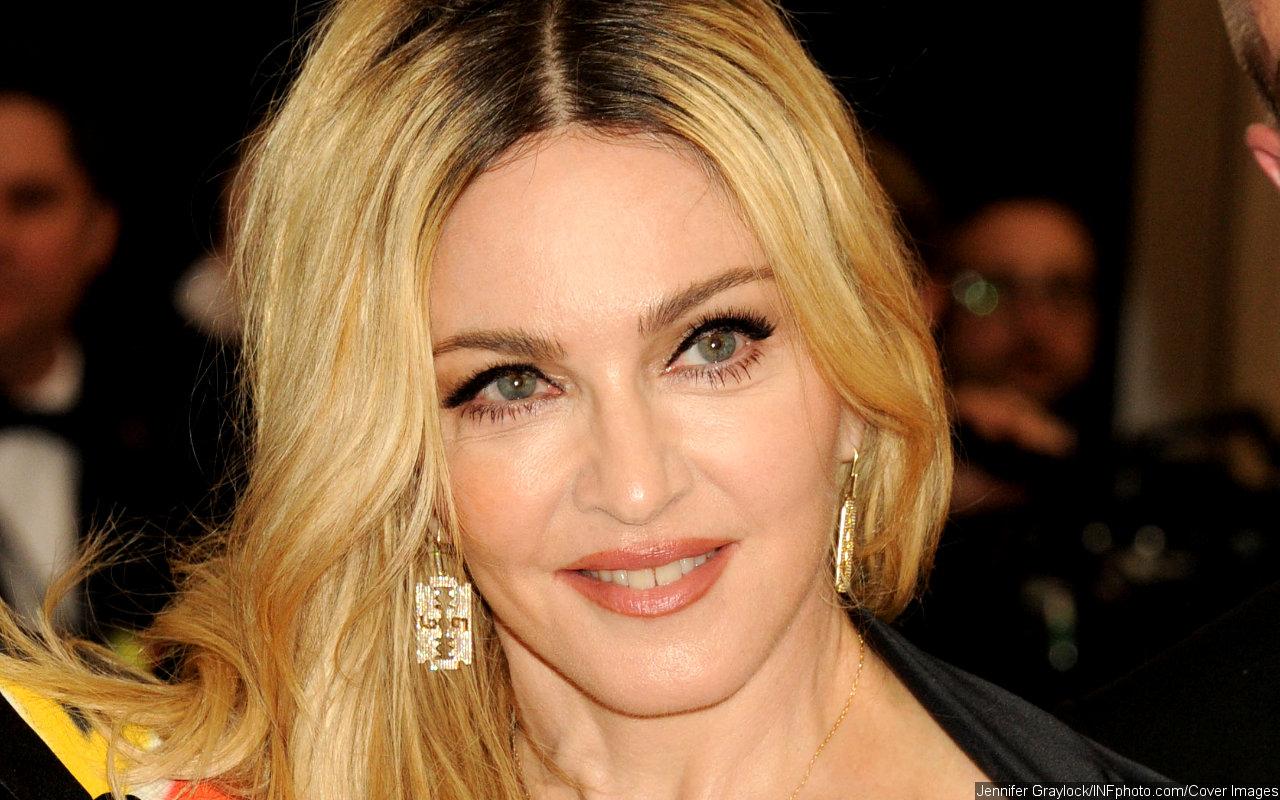 Madonna Rocks Black Lace Bustier at Miami Exhibition for Controversial 'Sex' Book Re-Release