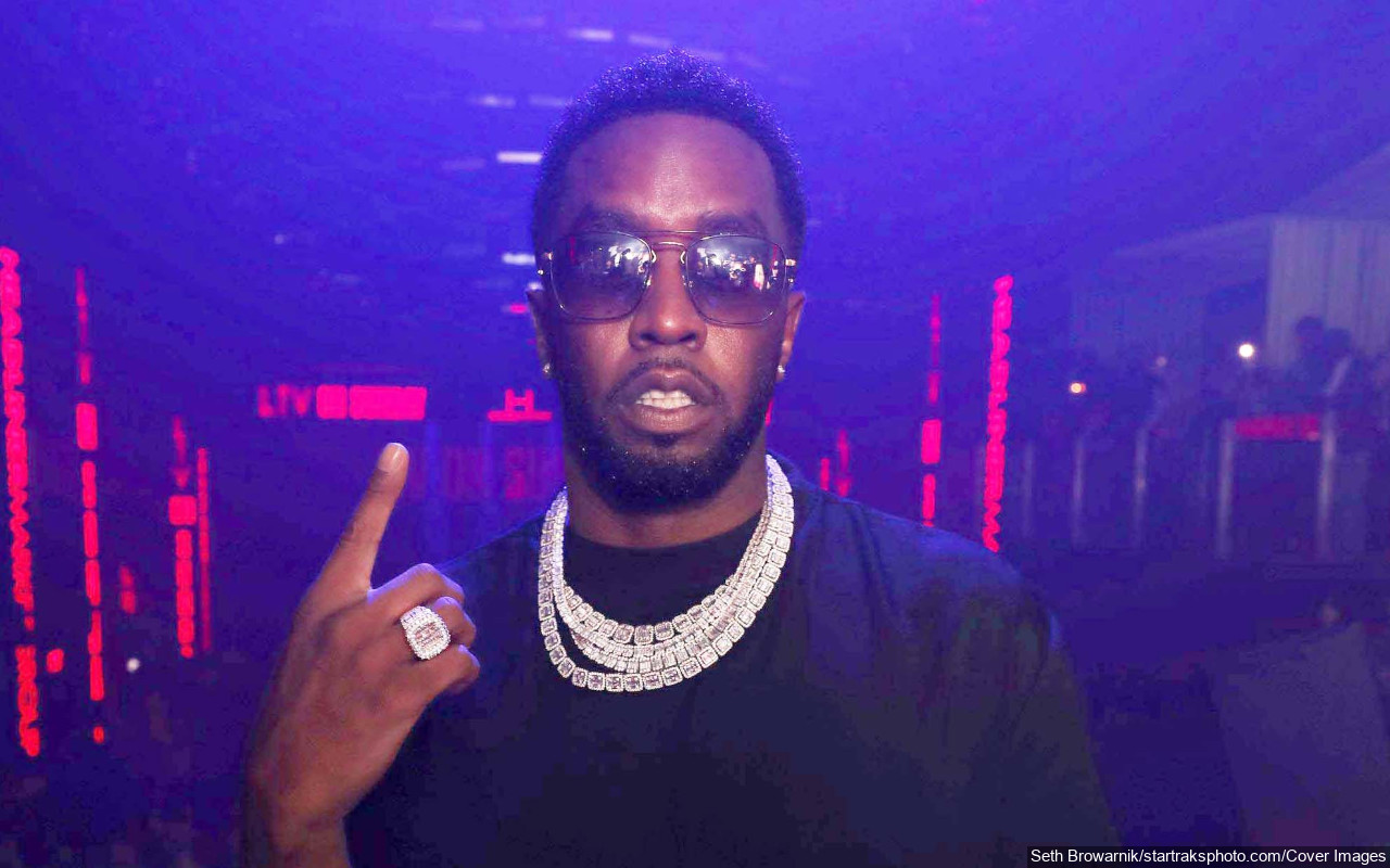 Diddy Shows Newborn Daughter for the First Time in Family Christmas Pic