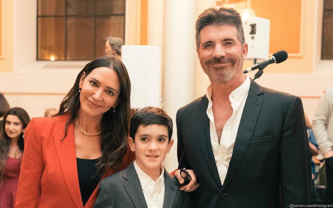 Simon Cowell Barely Recognizable During Christmas Carol Event With Fiancee and Son